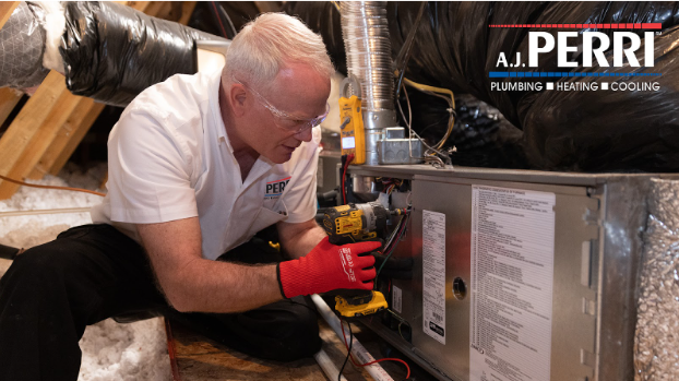 Air Experts technician providing heating service on a furnace in a New Jersey home.
