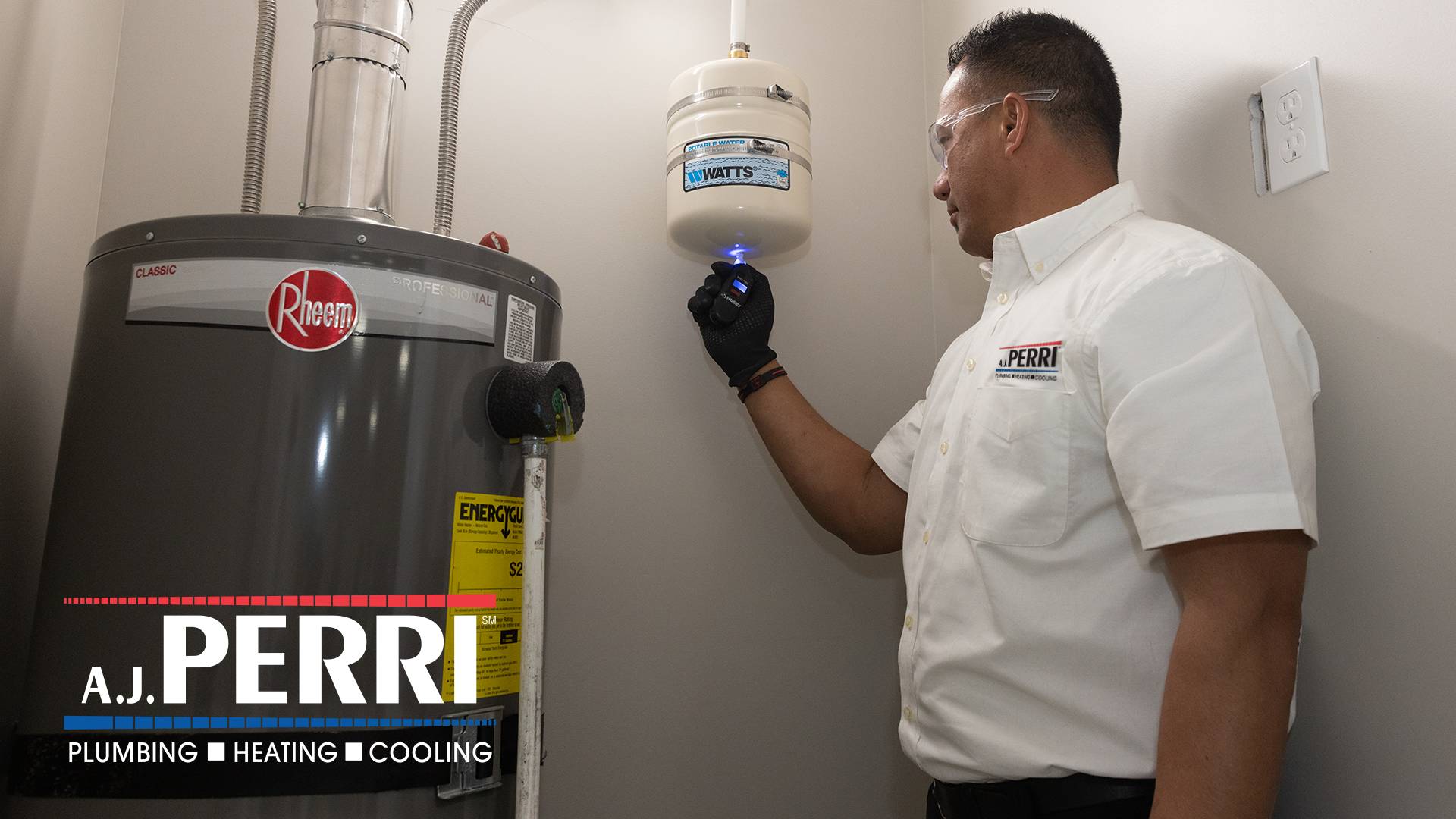 A.J. Perri technician inspecting a water heater in a New Jersey home.